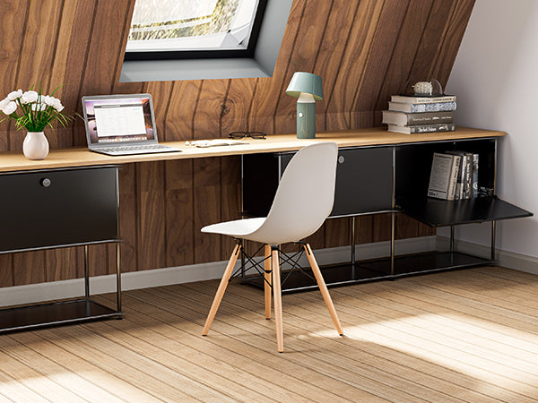 SAINCH black modular storage cabinet styled in a modern living room with books and decor